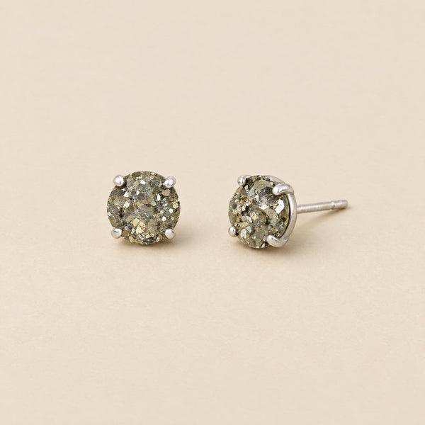 Round pyrite stud earrings in silver-tone settings