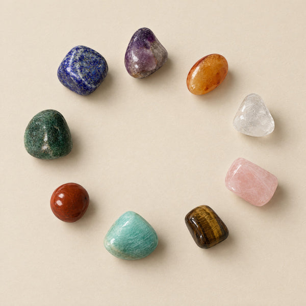 Nine polished tumbled stones in a circle