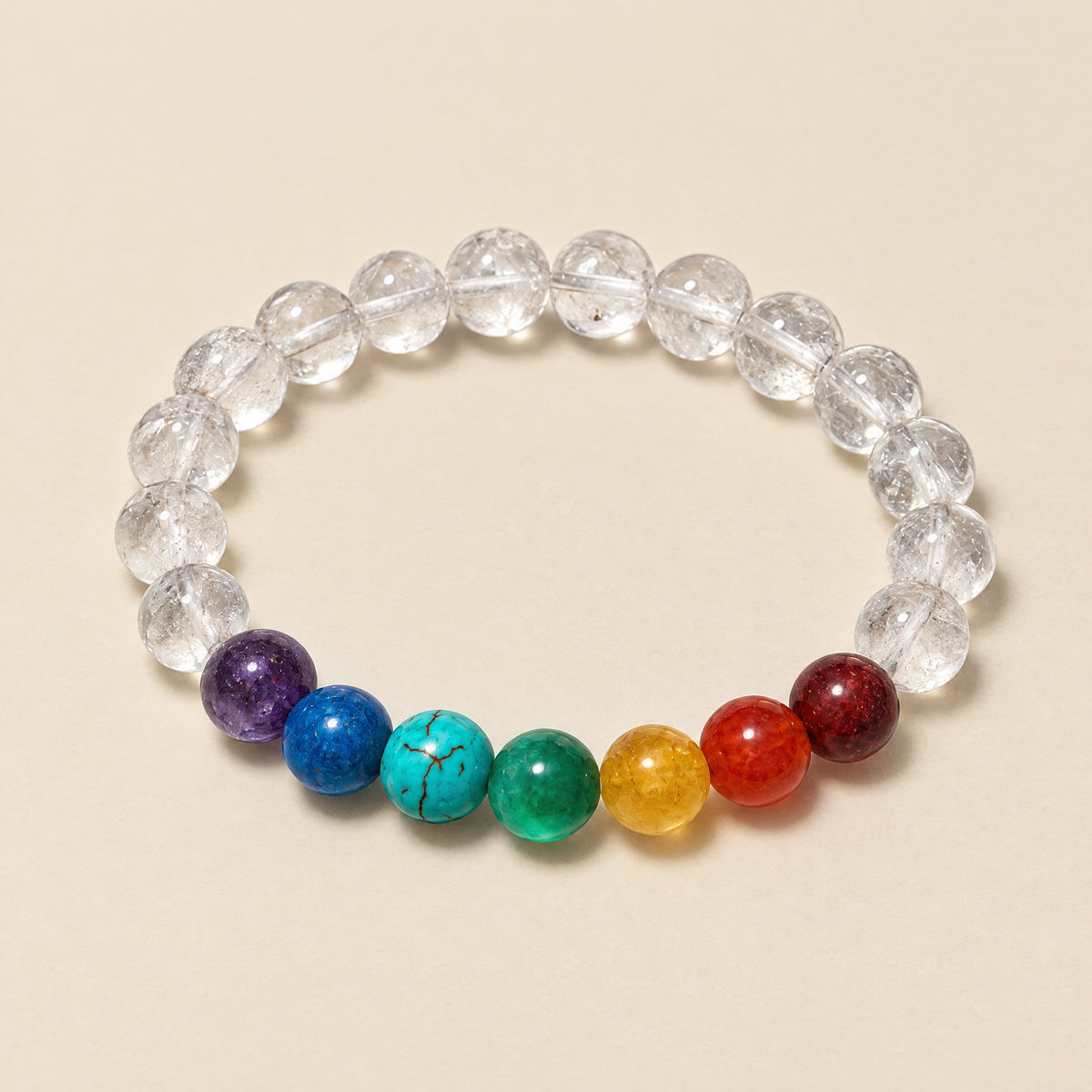 Clear quartz bracelet with 7 chakra beads, 8mm beads