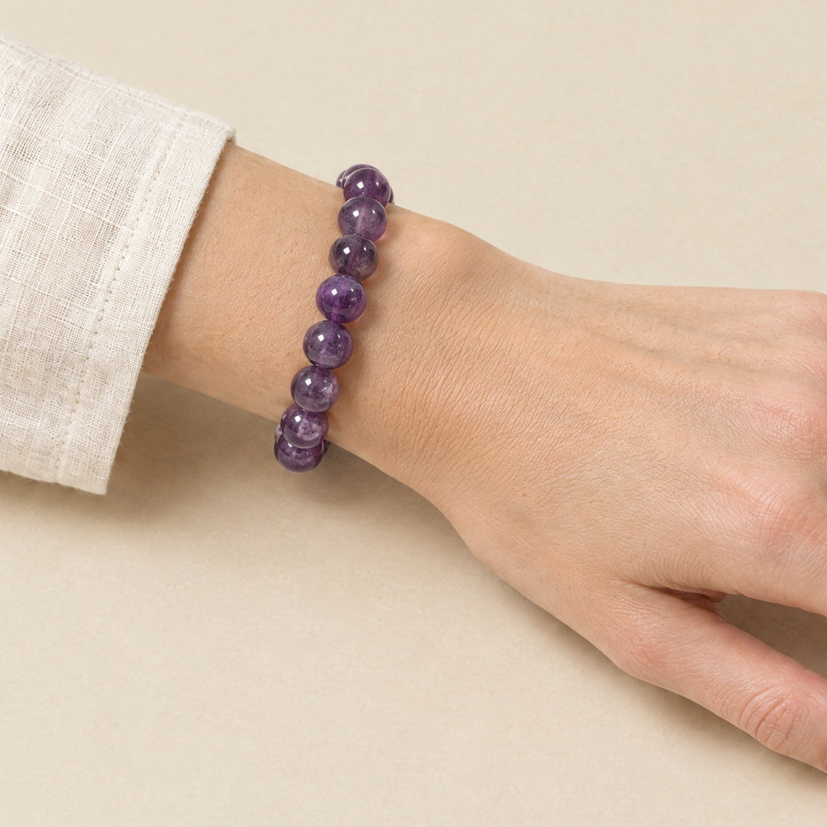 Amethyst bracelet worn on a woman's wrist