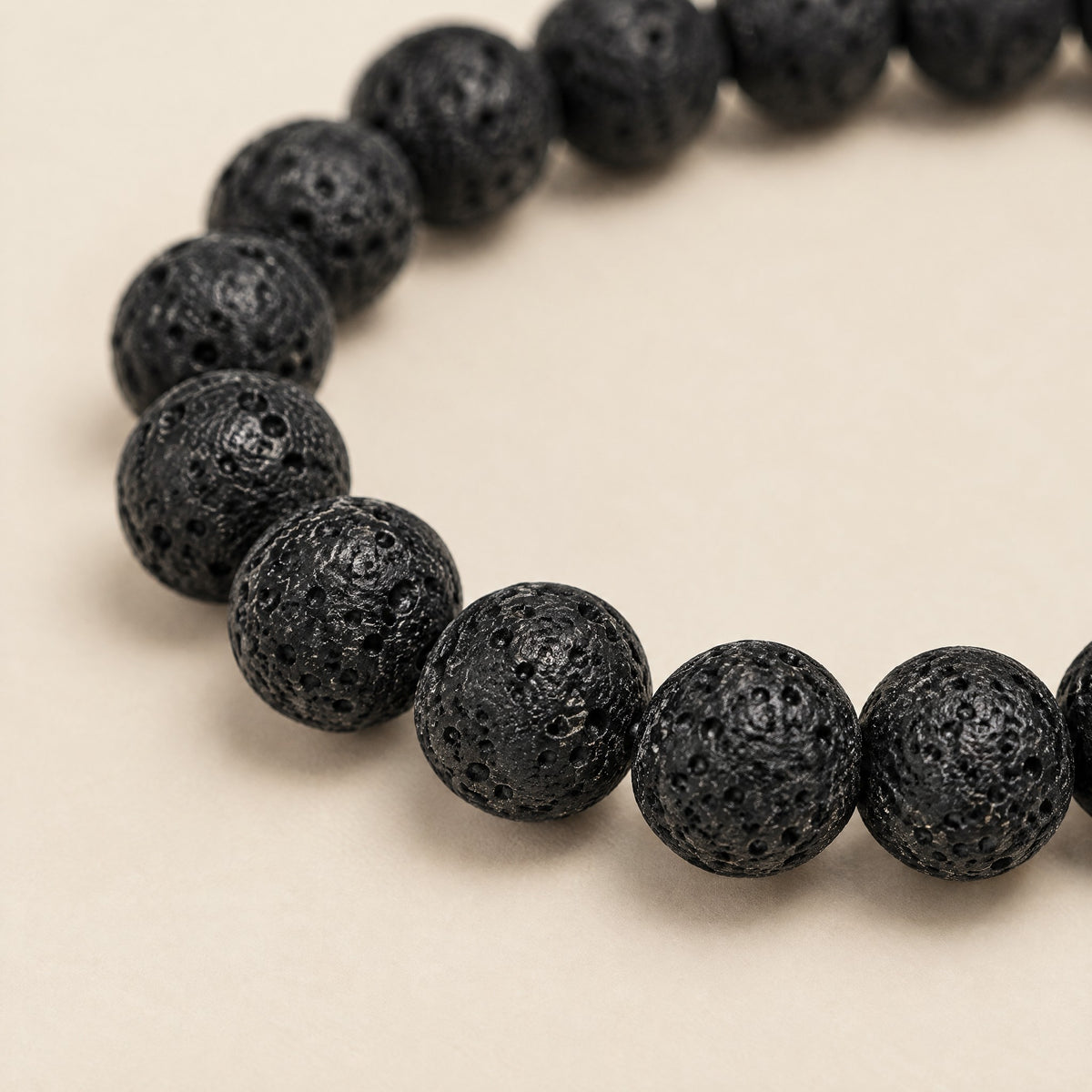 Close-up of the black lava stone beads