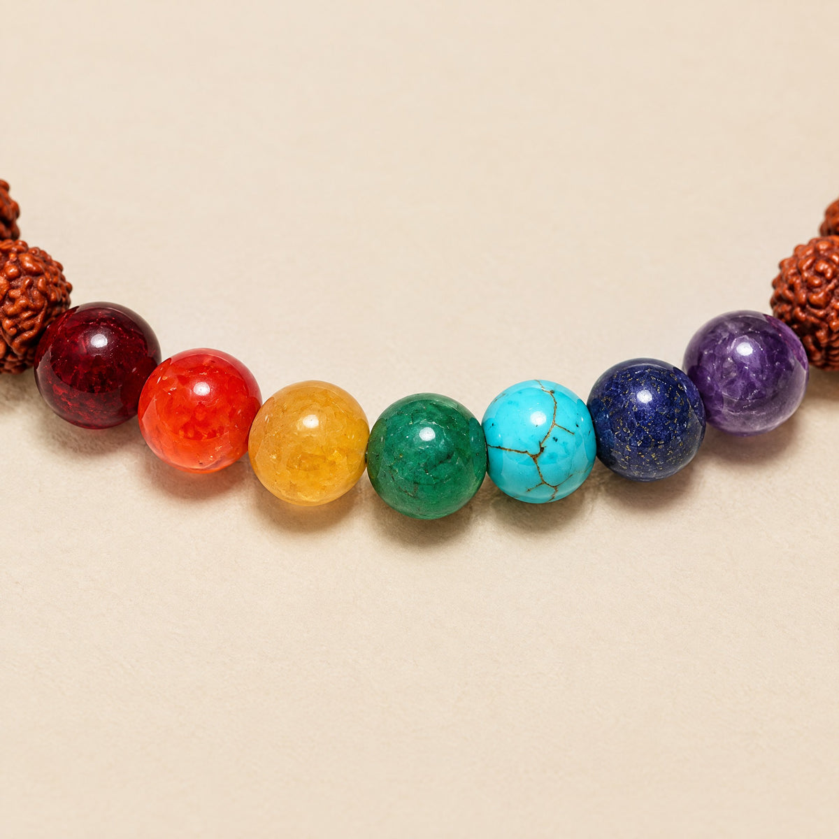 Close-up of the 7 chakra and rudraksha beads