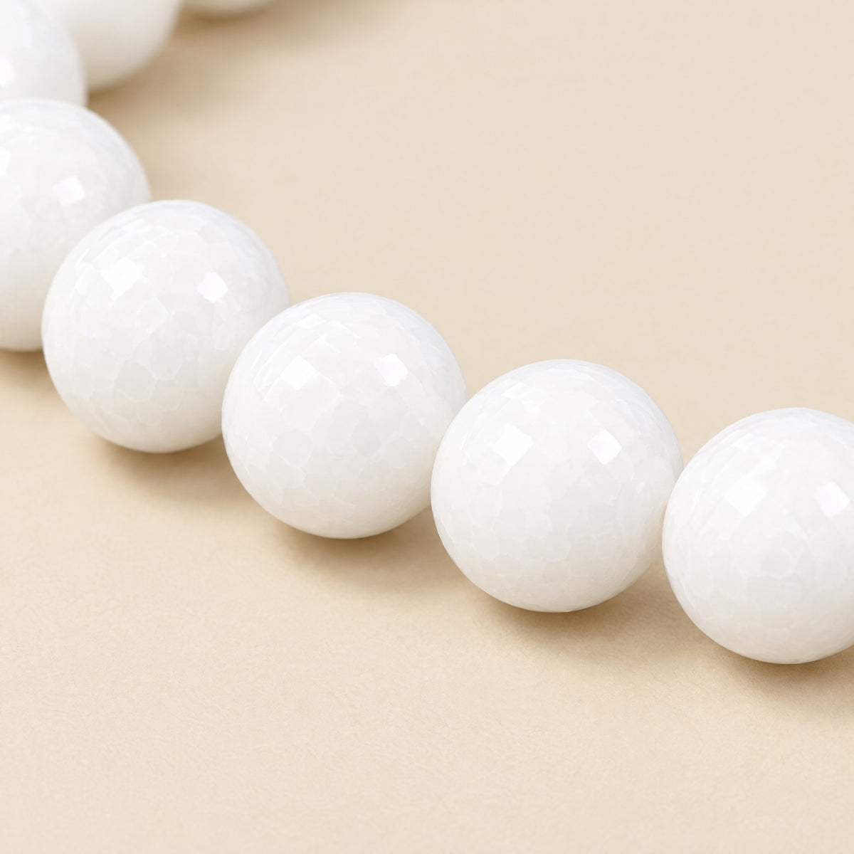 Close-up of the white onyx beads