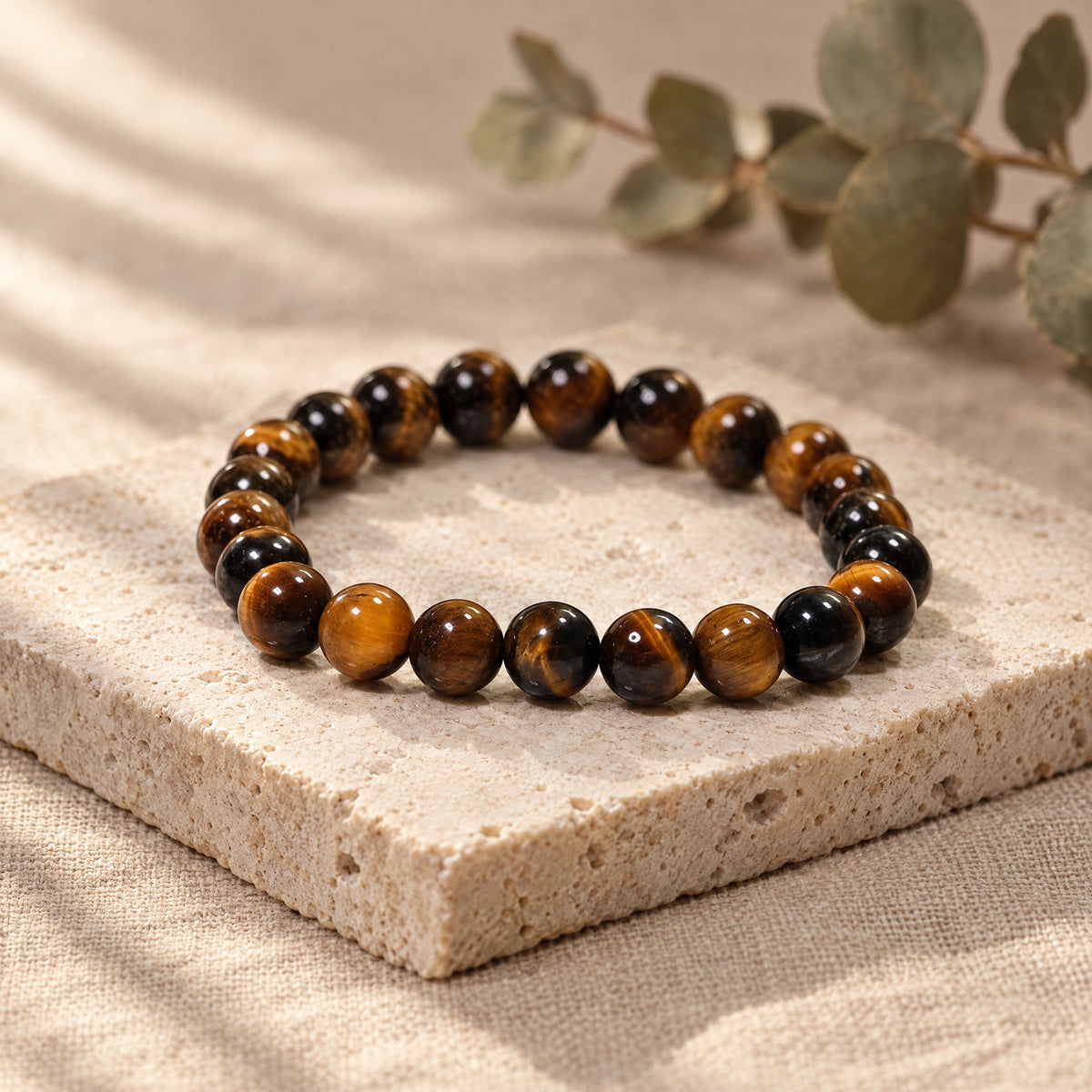 Tiger eye bracelet on a travertine stone