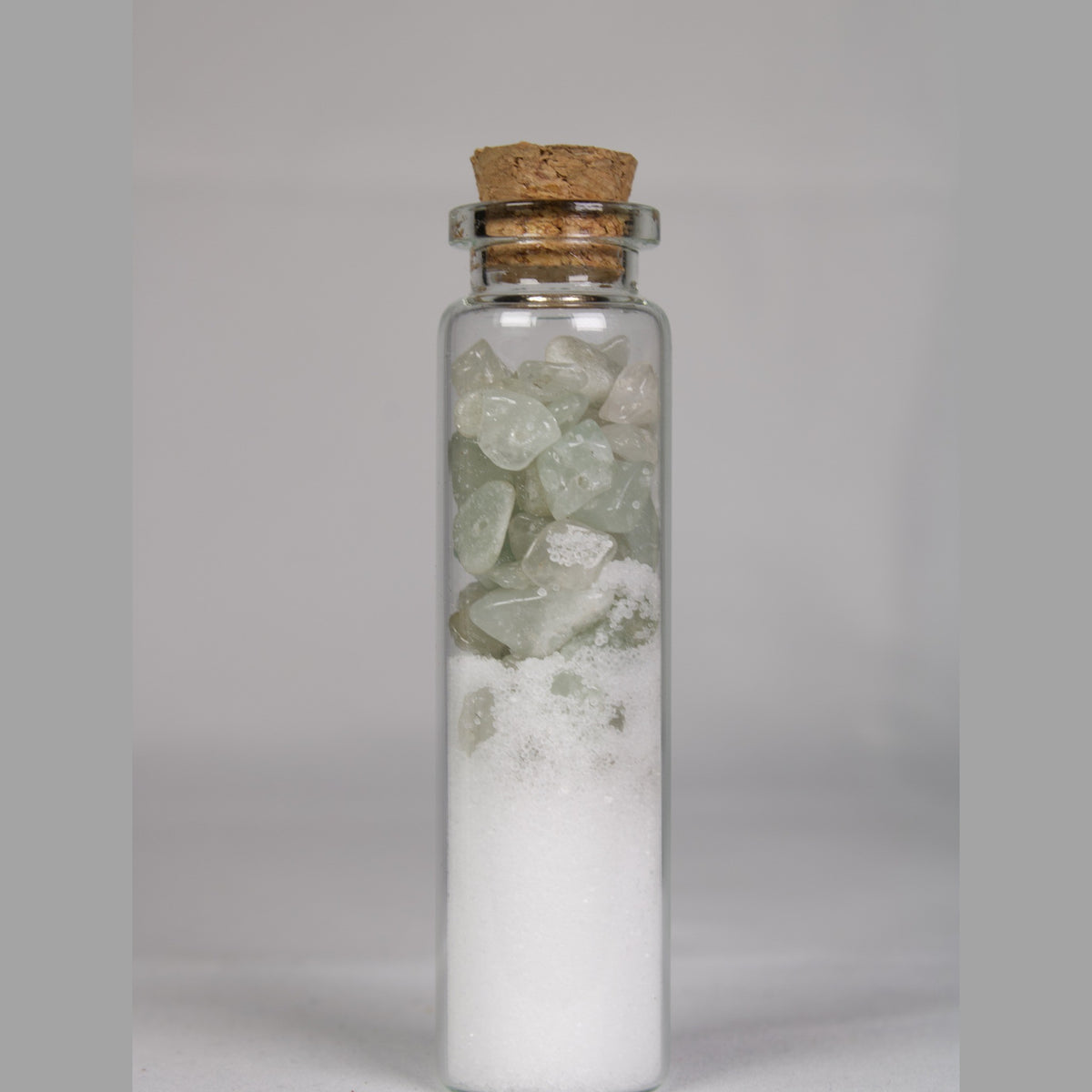 Crystal intention jar for Renewal: light green aventurine chips and salt