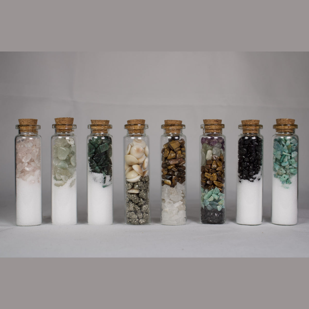 Unedited photo of all eight crystal intention jars