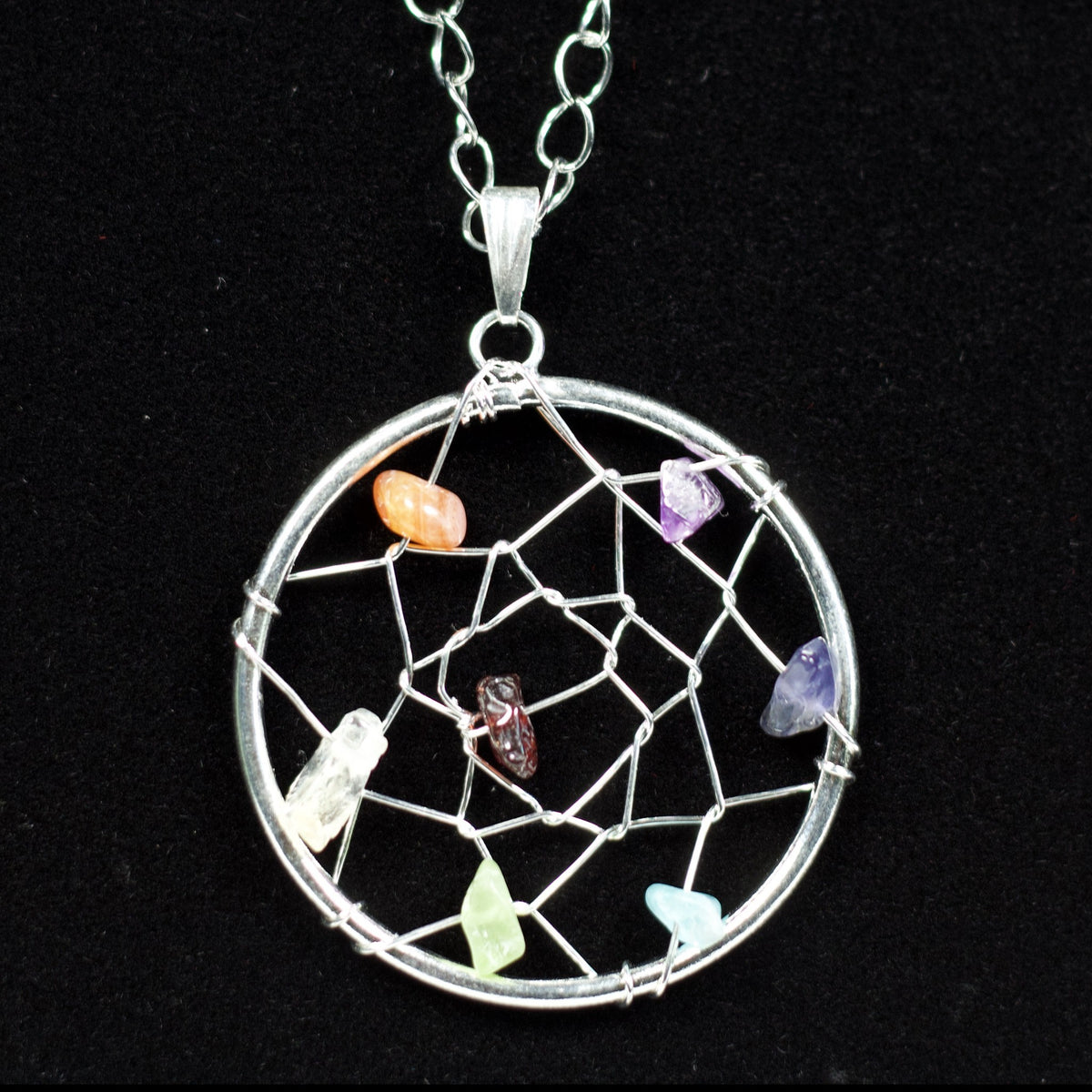 Unedited photo of the 7 chakra dream catcher pendant