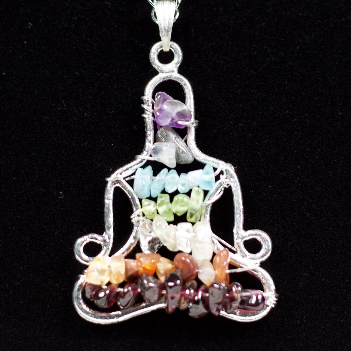 Unedited photo of the 7 chakra yoga meditation pendant
