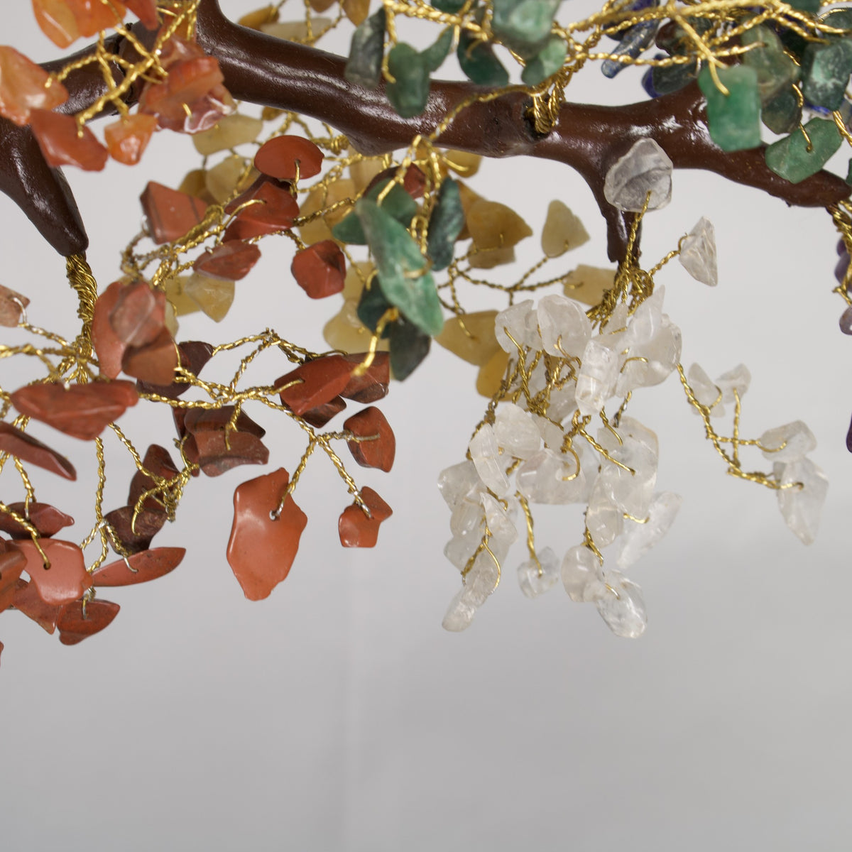 Close-up of the chakra chip clusters on gold-tone wire branches