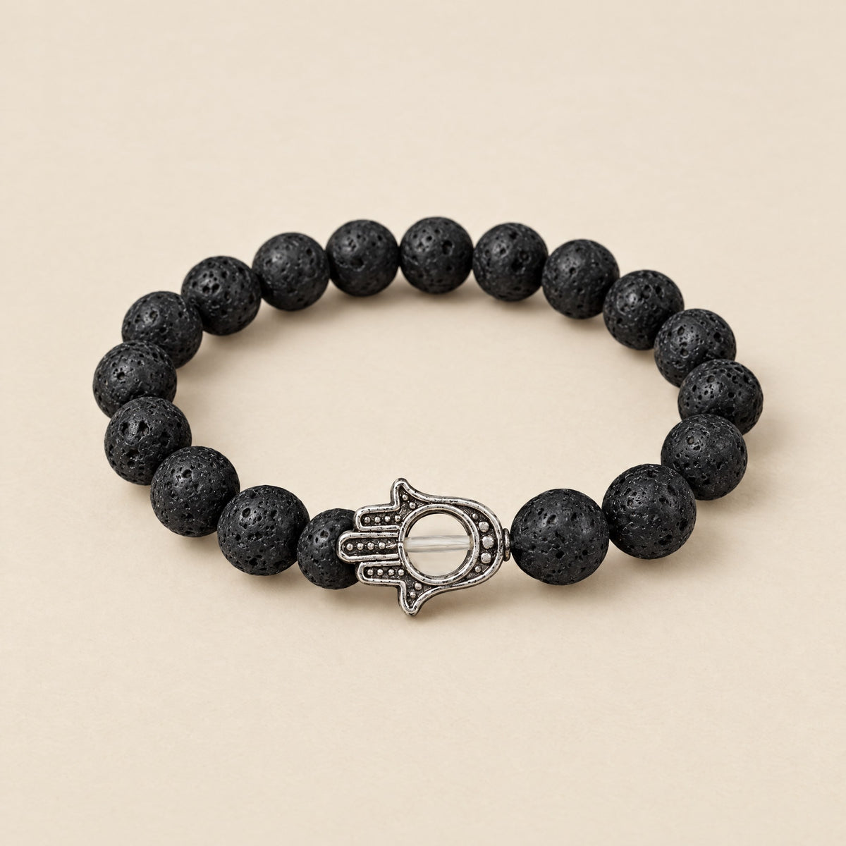 Hamsa Hand Bracelet: 8 mm lava stone beads with a silver-tone Hamsa hand charm