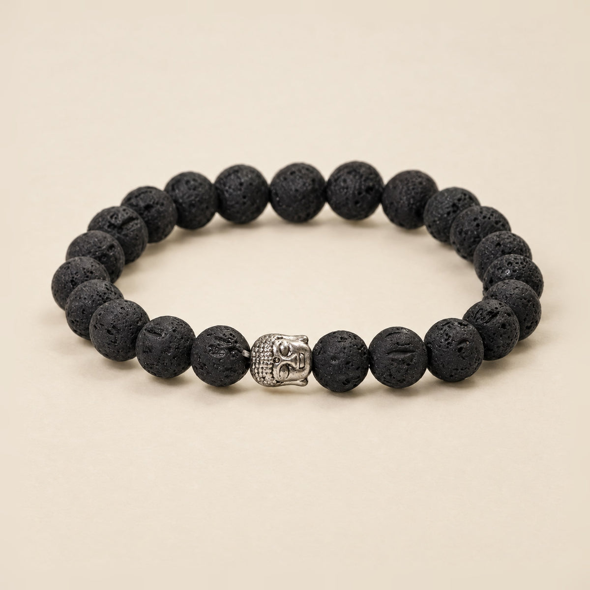 Black lava stone bracelet with a silver-tone Buddha bead, 8mm beads