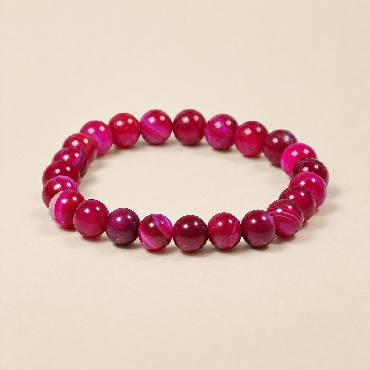 Pink onyx bracelet, 8mm magenta-pink banded beads