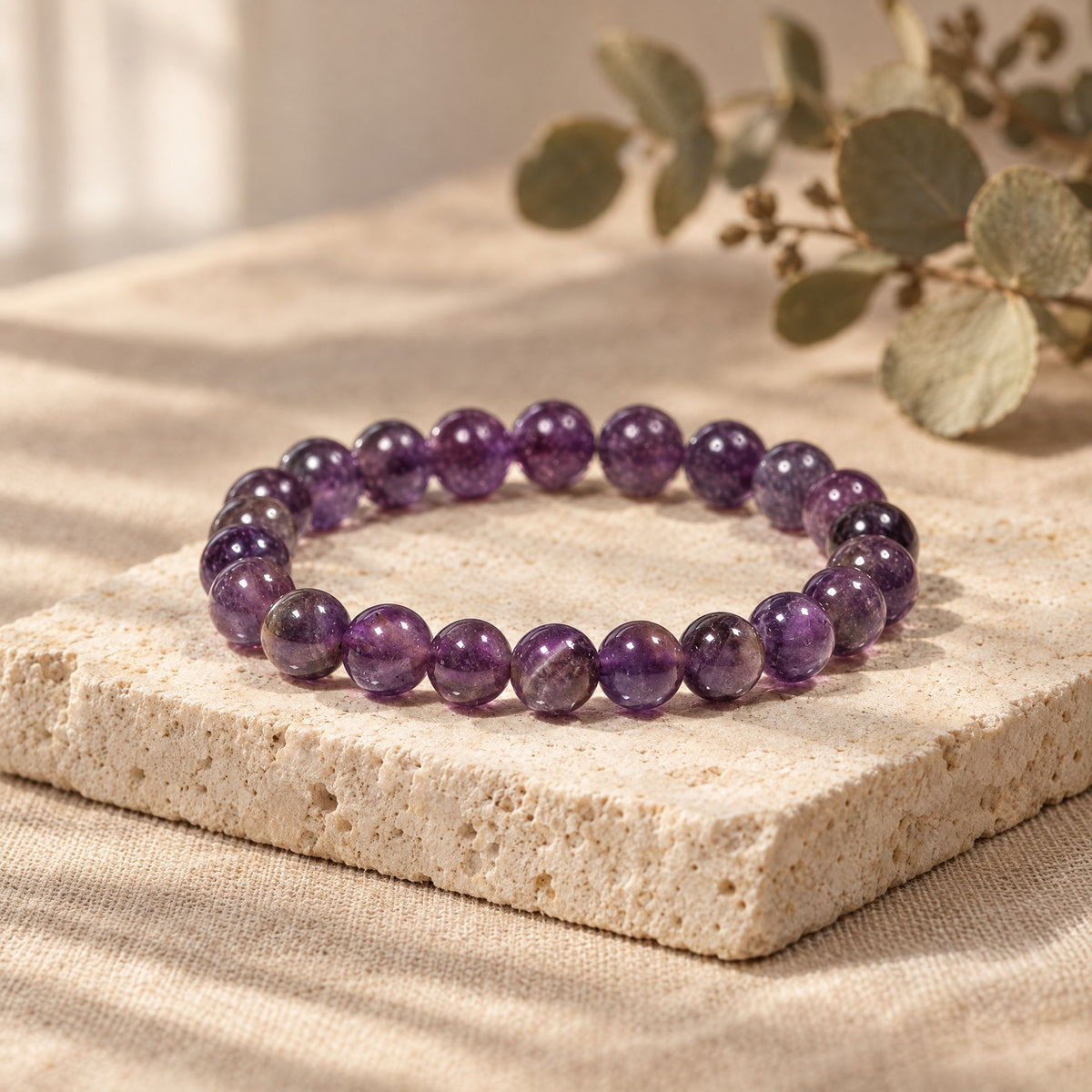 Amethyst bracelet on a travertine stone