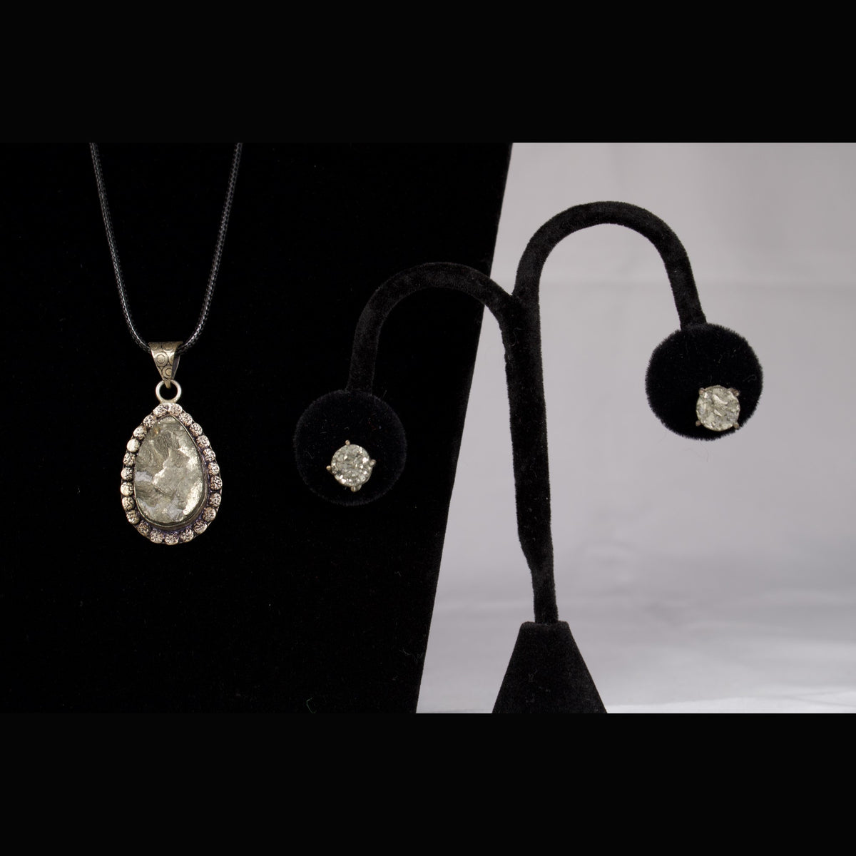 Unedited photo of the pyrite pendant with the matching stud earrings