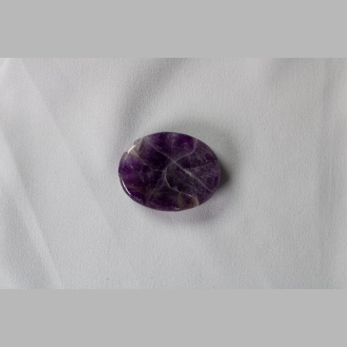 Unedited photo of the amethyst worry stone