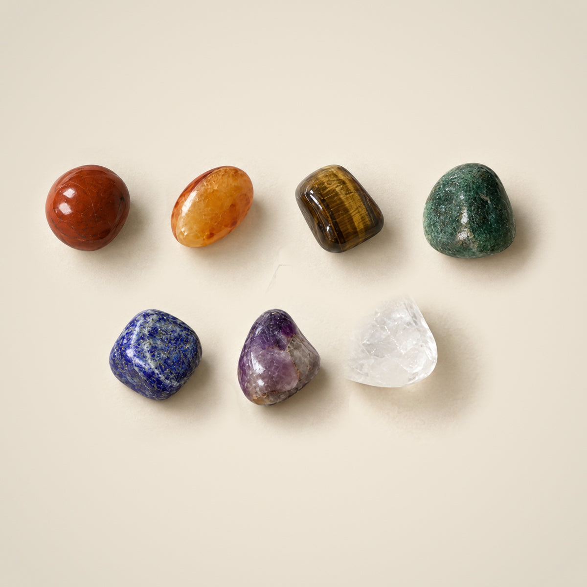 7 chakra tumbled stones: red jasper, carnelian, tiger eye, green aventurine, lapis, amethyst, clear quartz