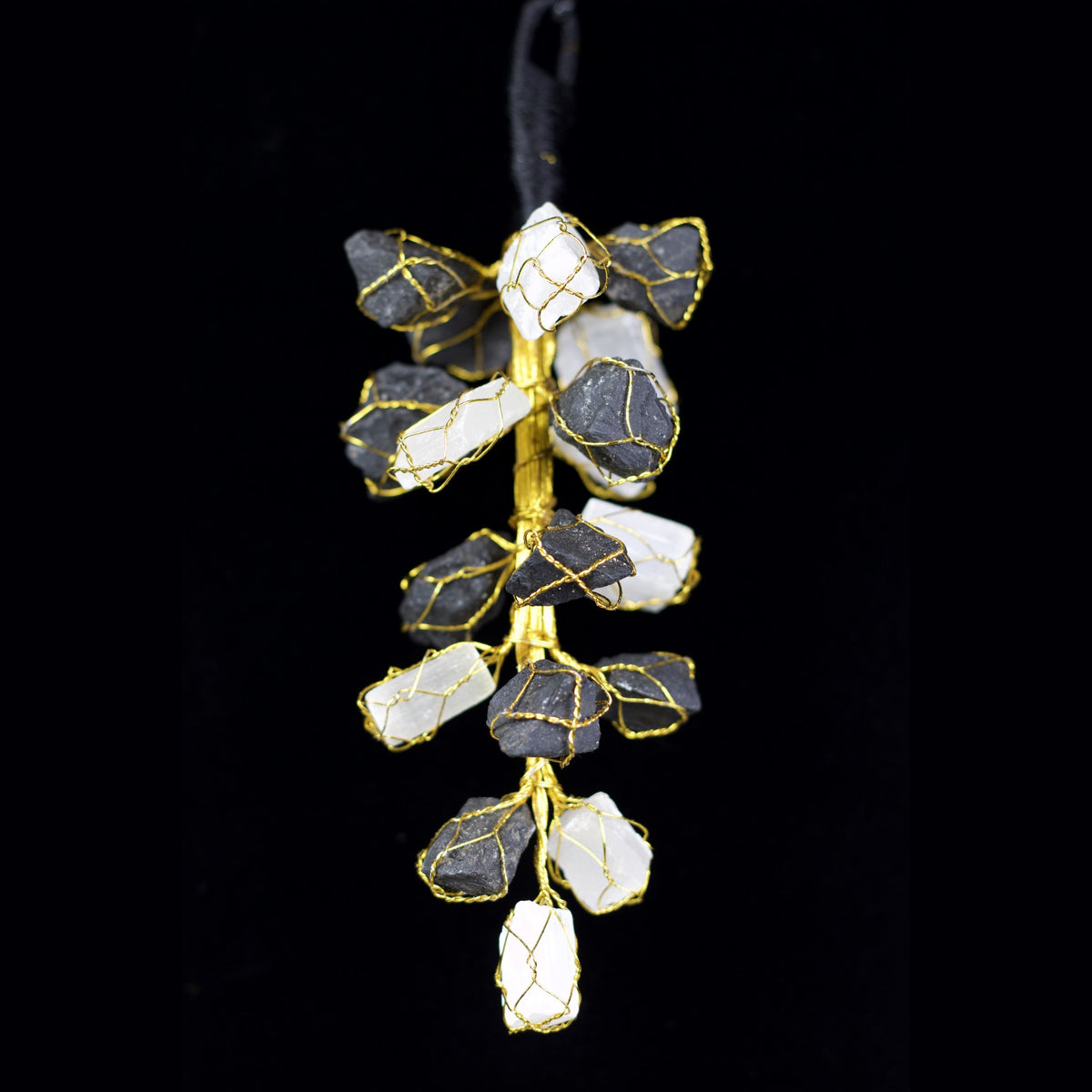 Unedited photo of the selenite & black tourmaline hanging