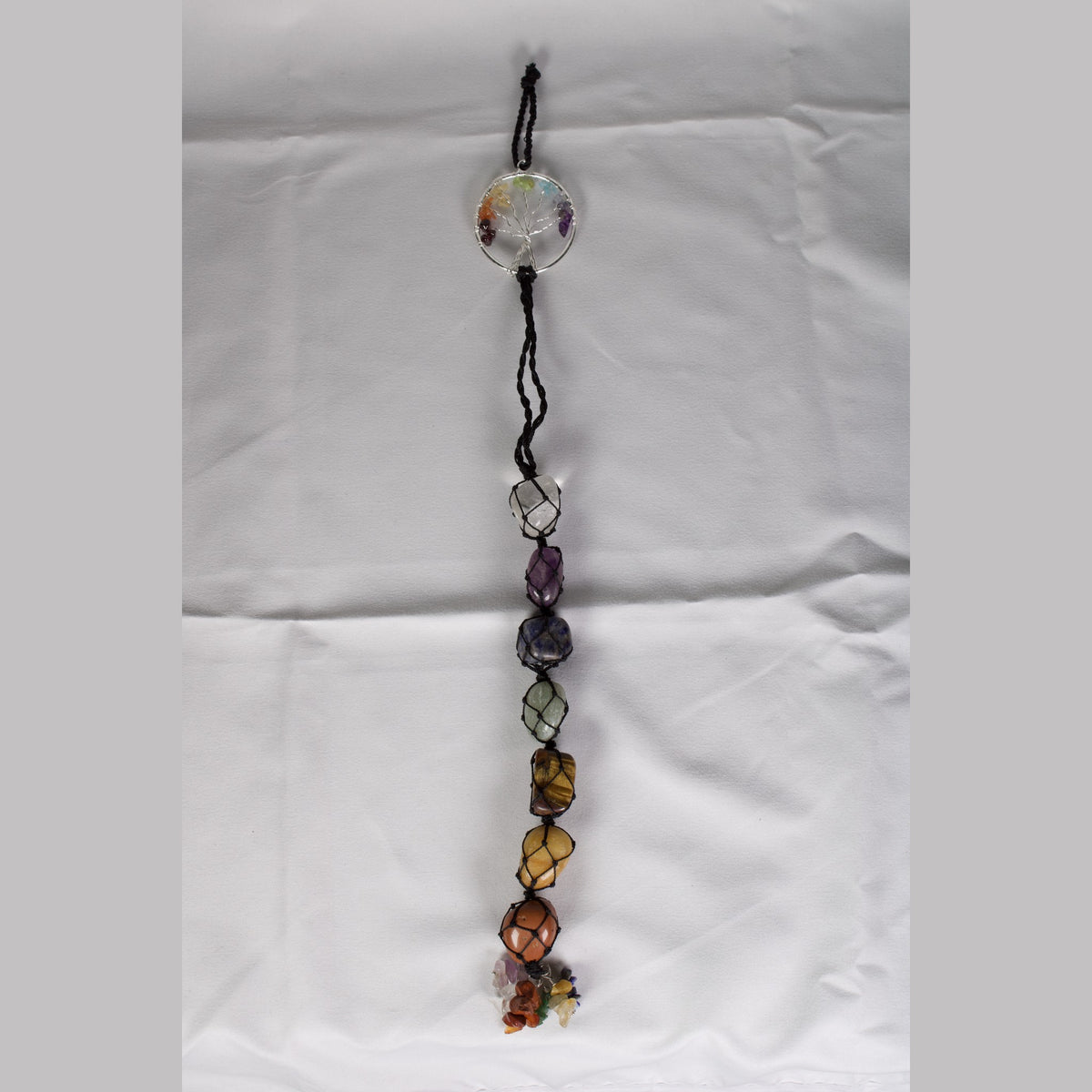 Unedited photo of the 7 Chakra tree of life crystal hanging