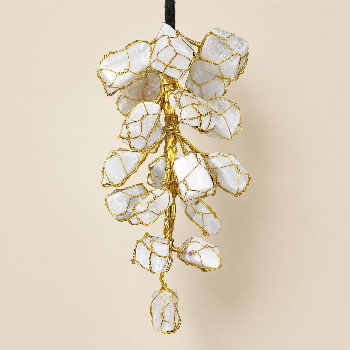 Selenite Hanging: rough white selenite pieces in gold-tone wire