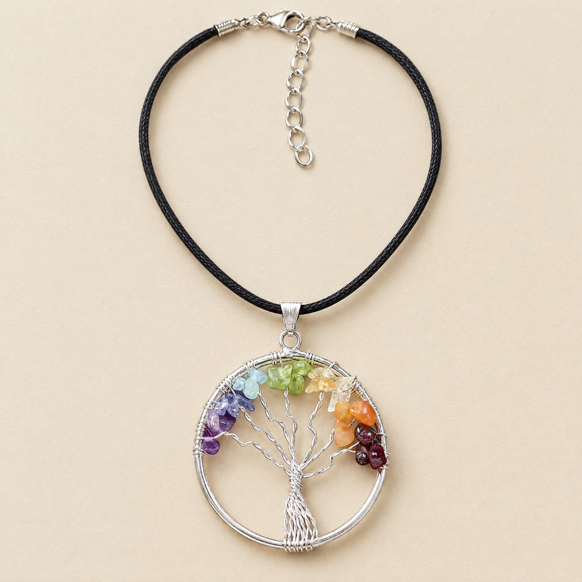 7 chakra tree of life necklace, round silver-tone wire pendant with gemstone chips on a black waxed cord