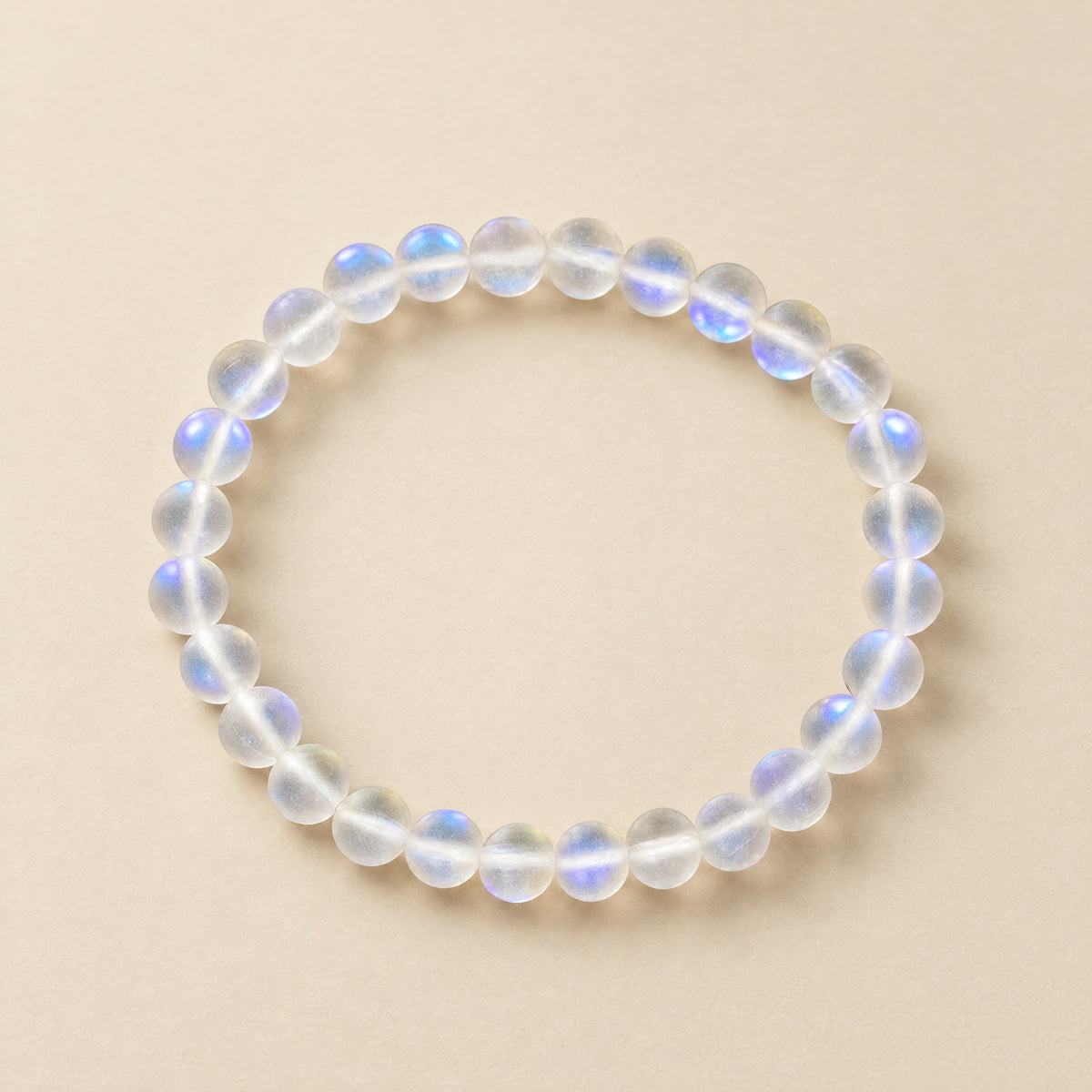 Aura Bracelet: frosted white beads with a blue flash