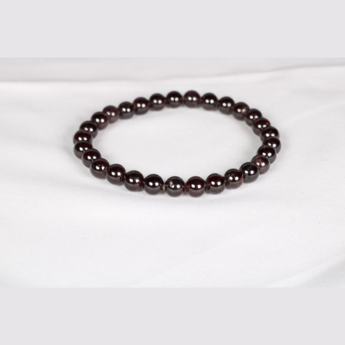 Unedited photo of the garnet bracelet
