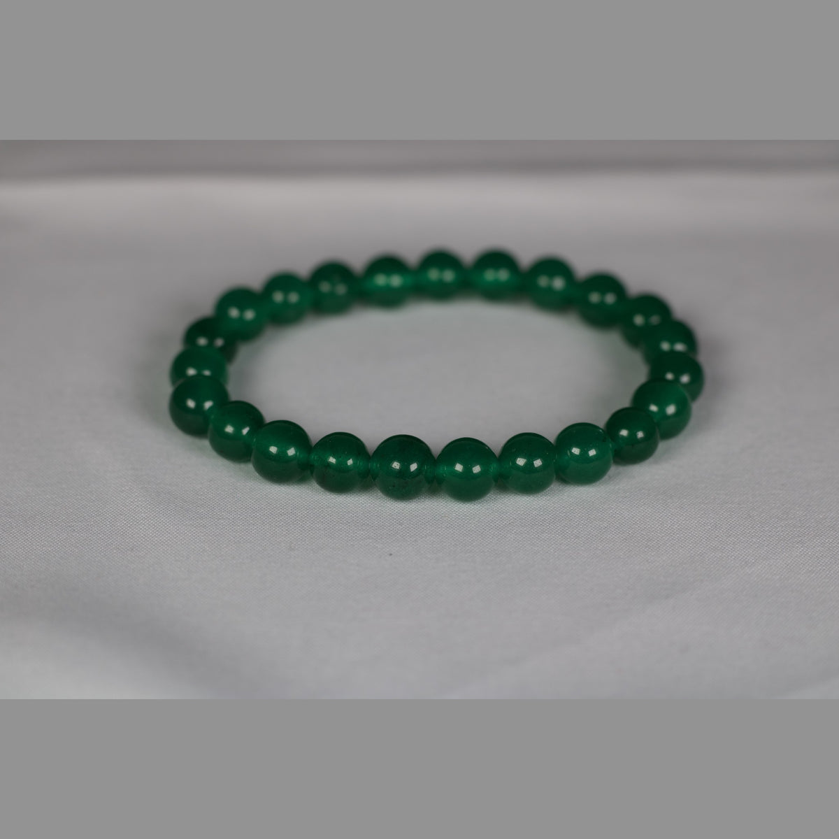 Unedited photo of the dark green onyx bracelet