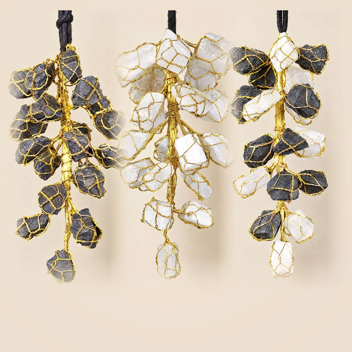 Protection trio: black tourmaline, selenite, and selenite with black tourmaline hangings